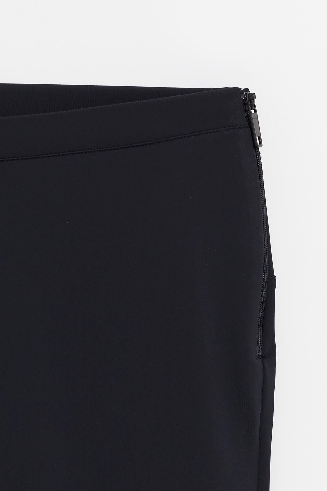 COURREGES BLACK REVERSED TECH JERSEY PANTS