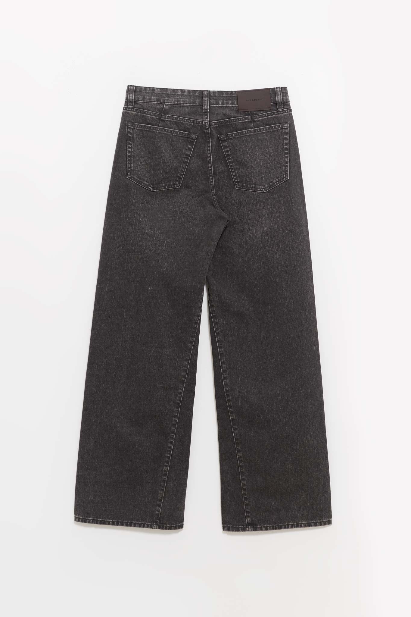 OUR LEGACY BLACK COATED TREBLE CUT TROUSERS