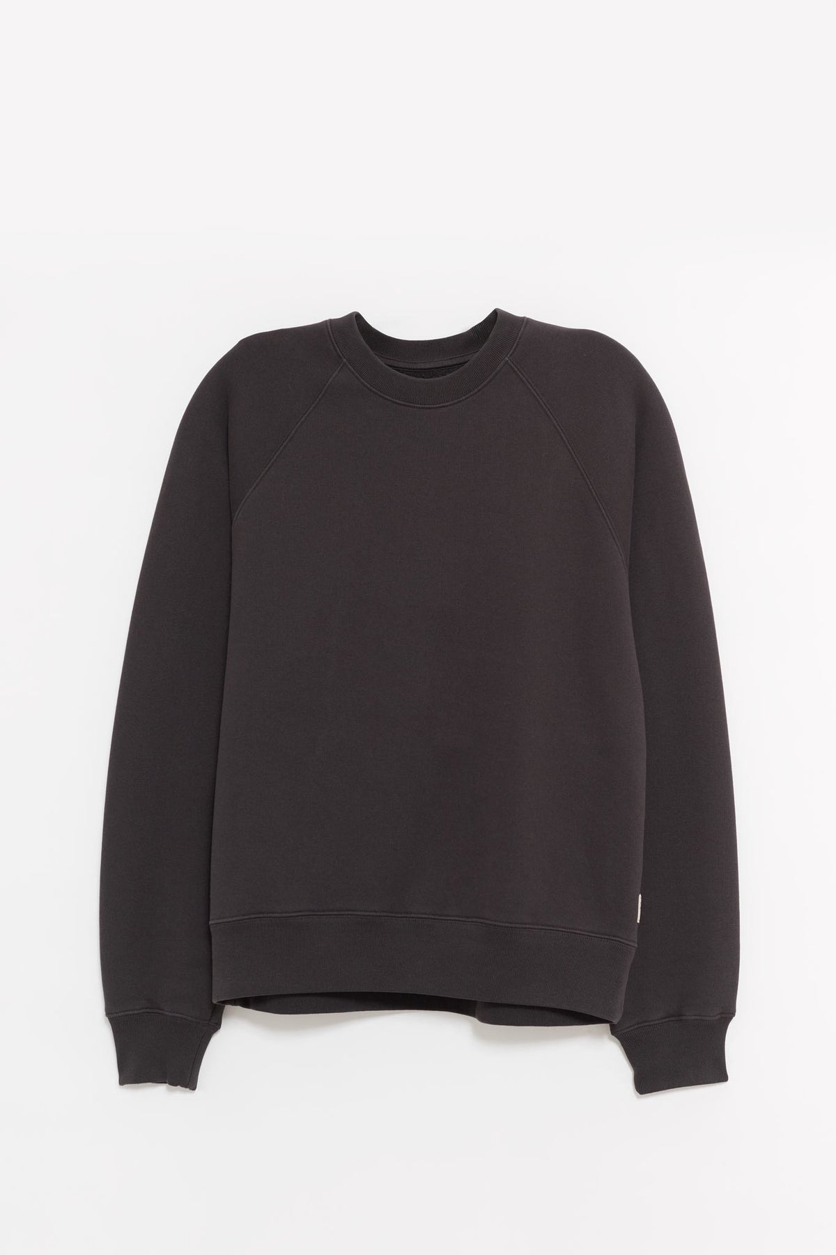 STUSSY WASHED BLACK FLEECE RAGLAN CREWNECK