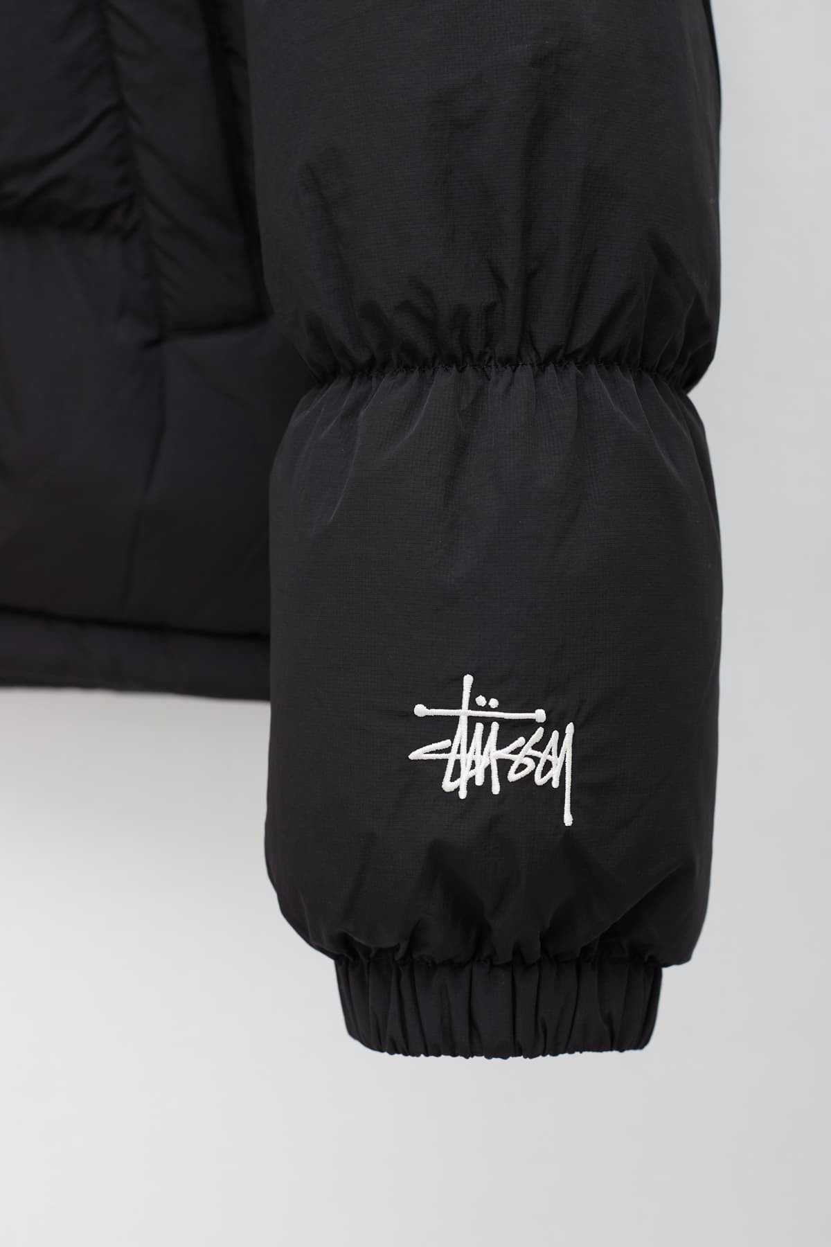 STUSSY BLACK RIPSTOP DOWN PUFFER JACKET IAMNUE