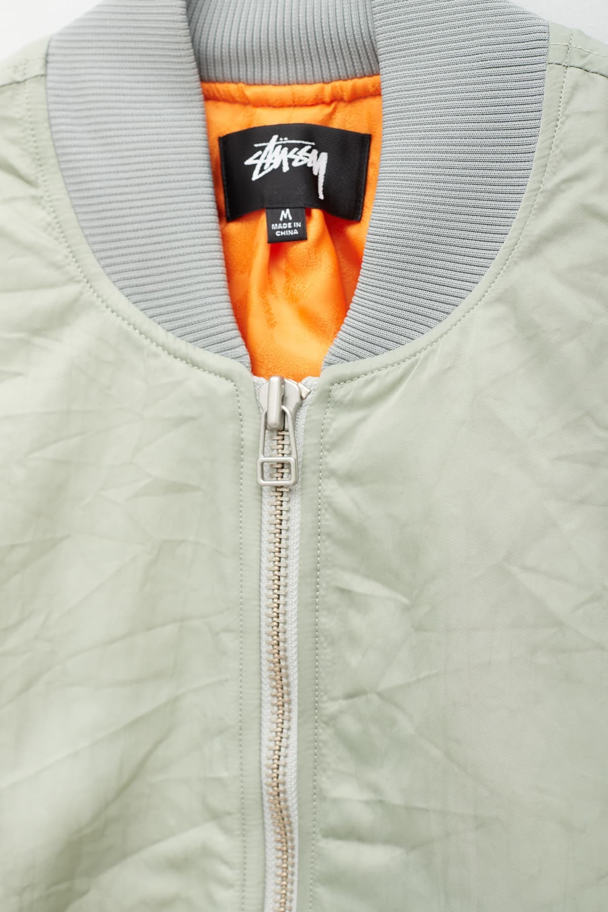 STUSSY STONE DYED NYLON BOMBER IAMNUE