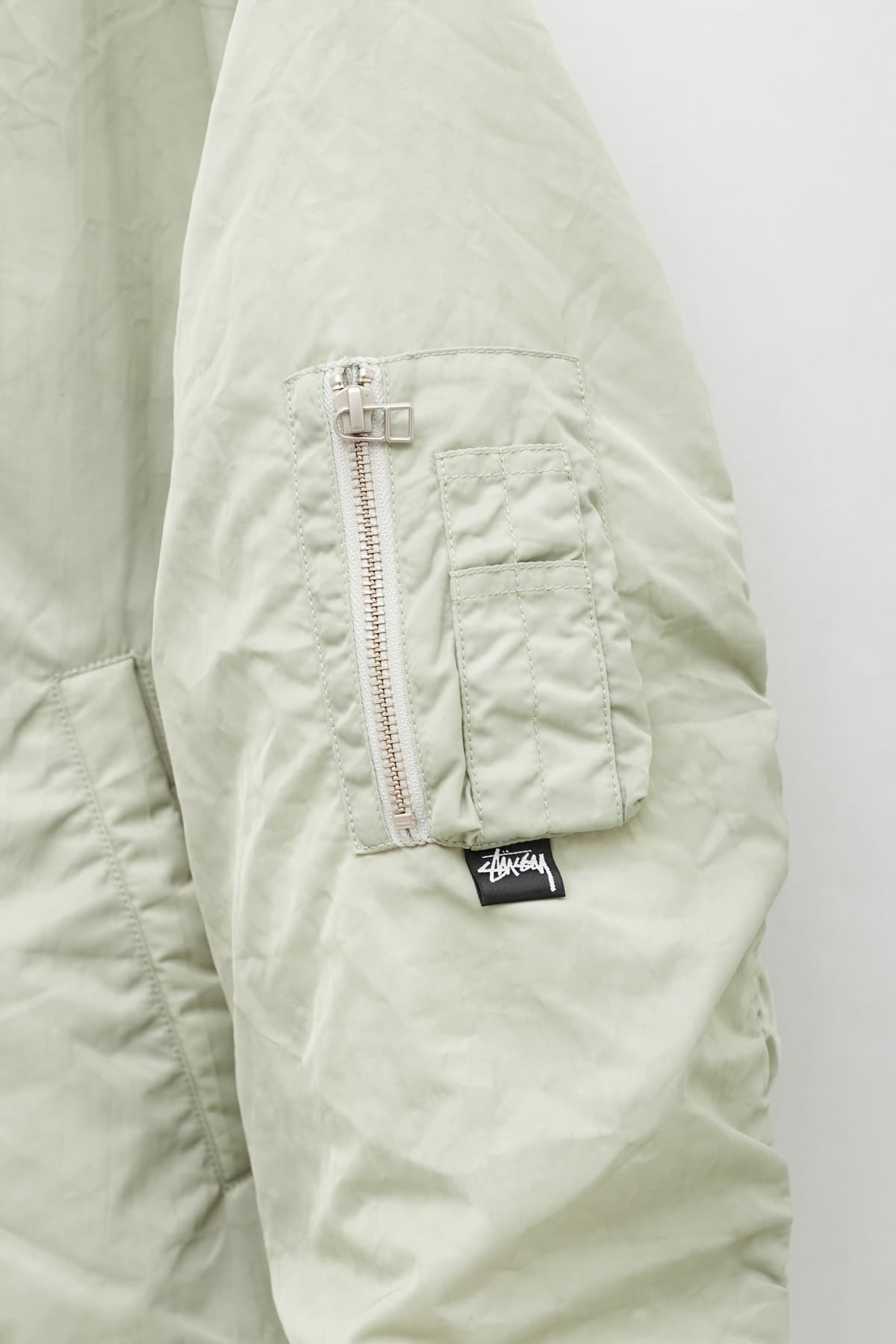 STUSSY STONE DYED NYLON BOMBER IAMNUE