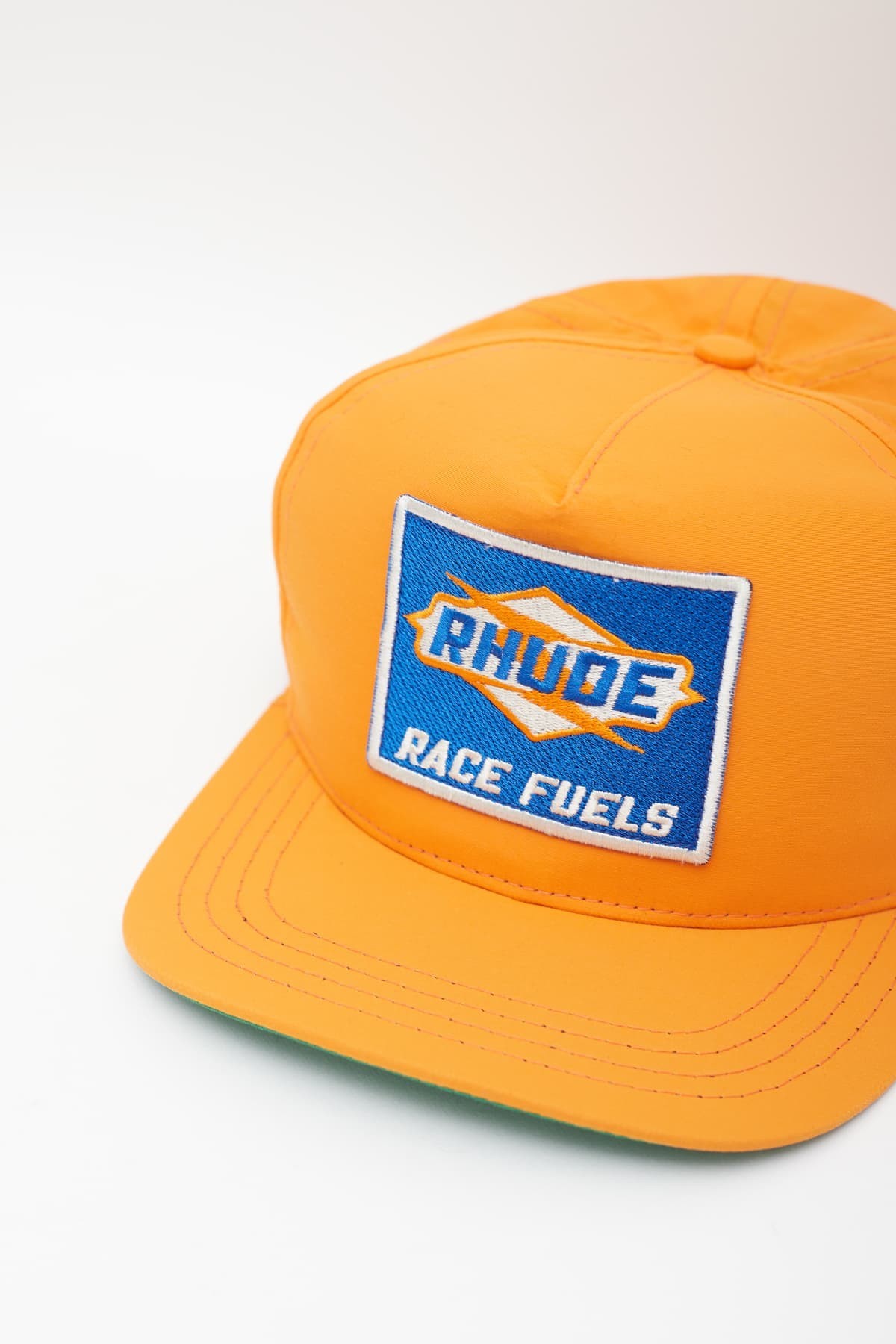 RHUDE ORANGE PETROLE HAT IAMNUE