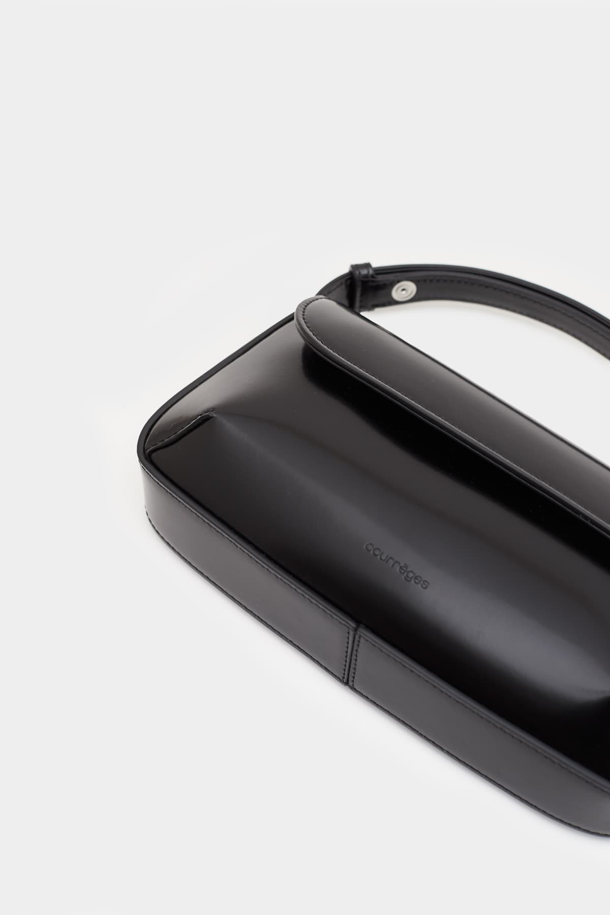 COURREGES BLACK SLEEK LEATHER BAG IAMNUE