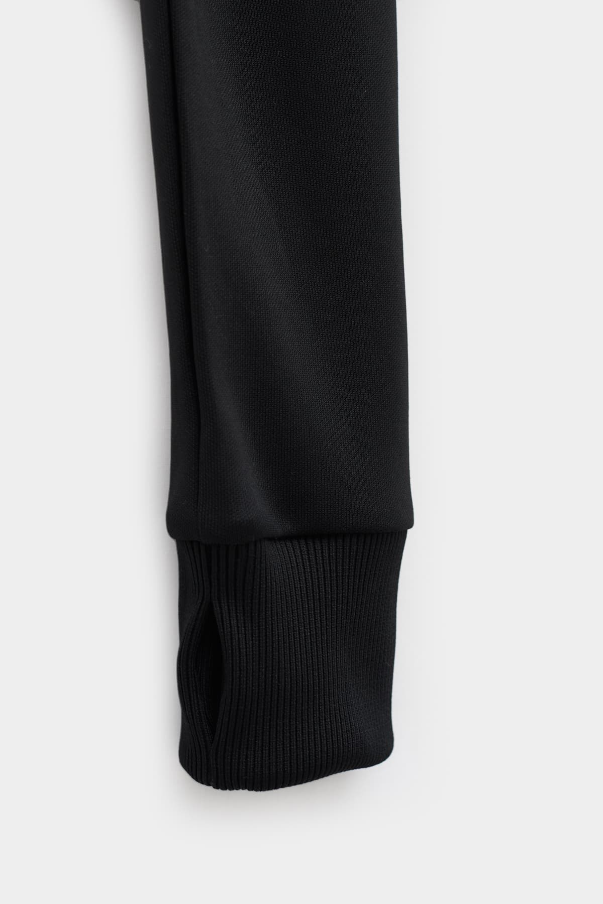 COURREGES BLACK MAXI RIB TRACKSUIT CROPPED JACKET IAMNUE