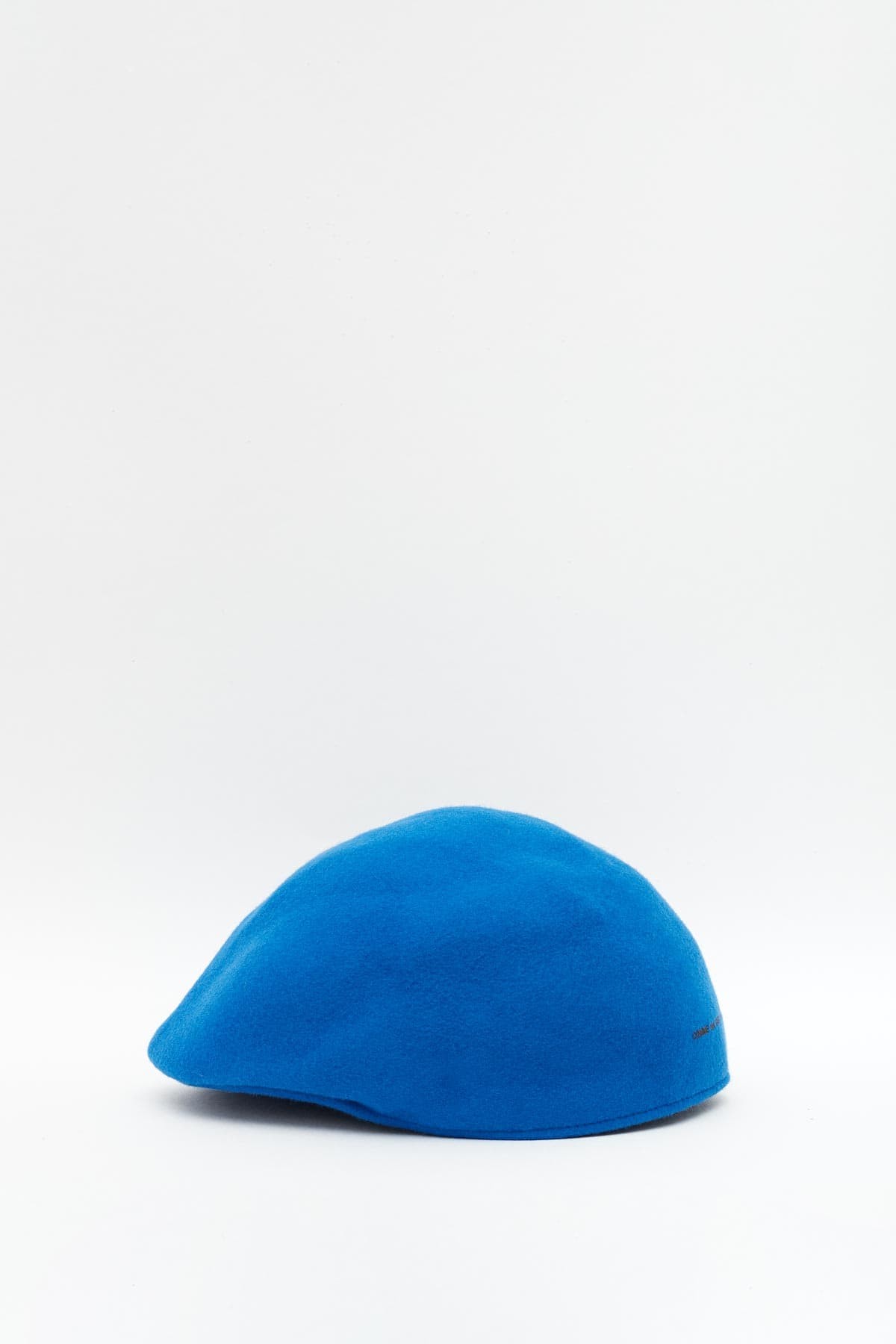 COMME DES GARCONS SHIRT BLUE HUNTING CAP IAMNUE