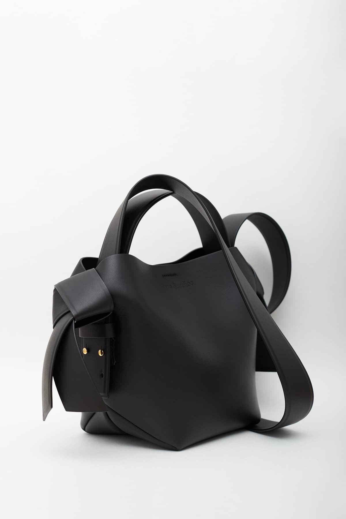 ACNE STUDIOS BLACK MUSUBI MINI HANDBAG IAMNUE