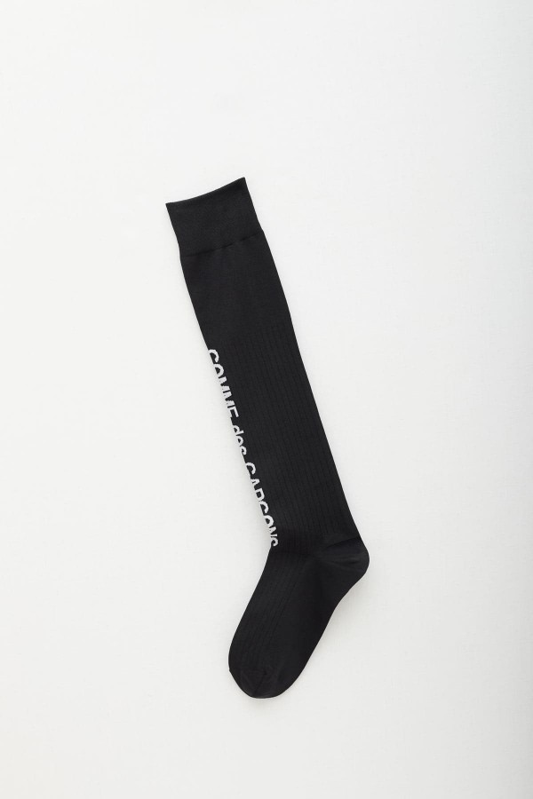 COMME DES GARCONS HOMME PLUS BLACK LOGO LONG SOCKS IAMNUE