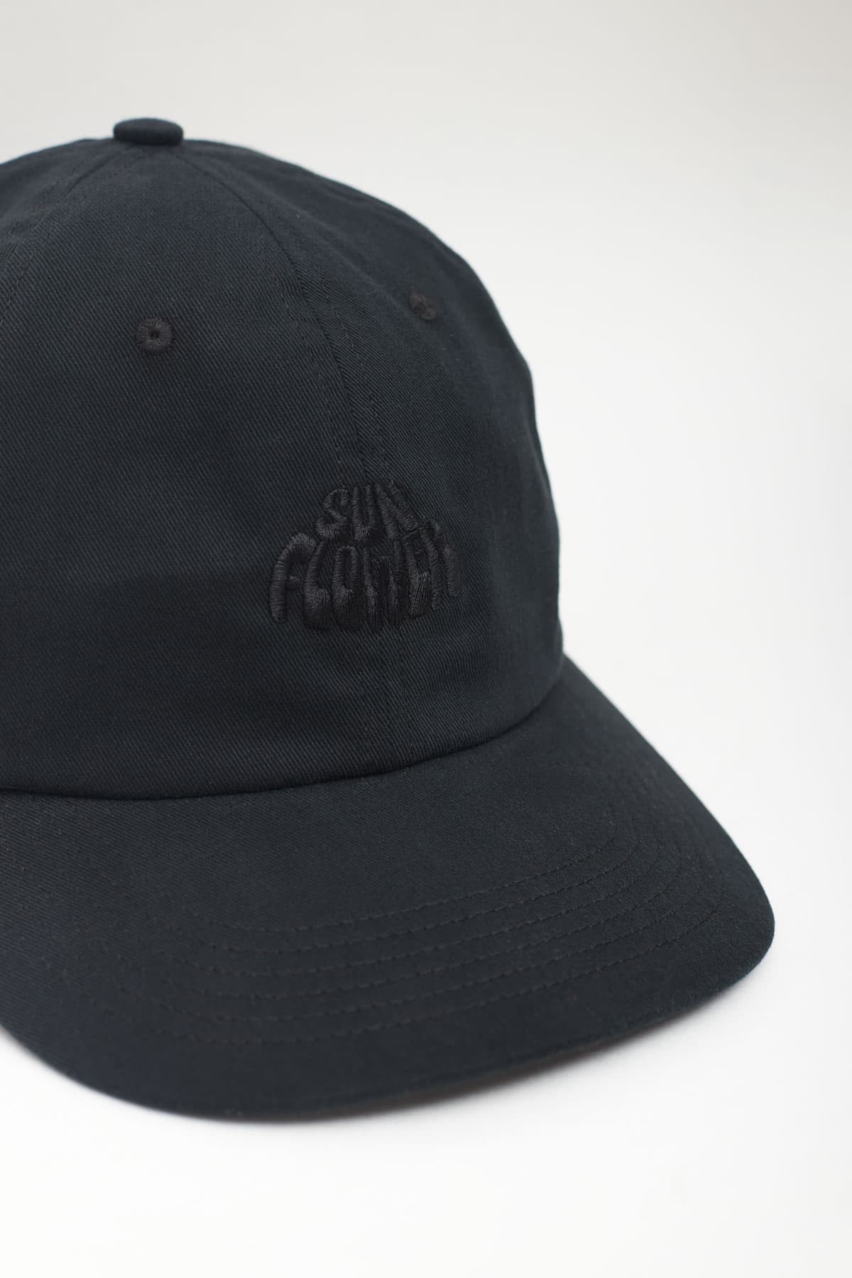 SUNFLOWER BLACK LOGO CAP IAMNUE