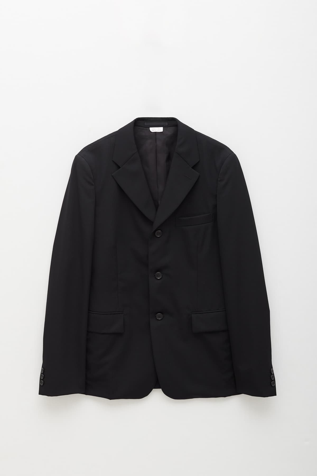 COMME DES GARCONS HOMME PLUS BLACK PERMANENT SUIT JACKET IAMNUE