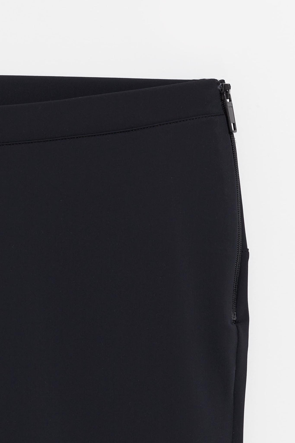 COURREGES BLACK REVERSED TECH JERSEY PANTS