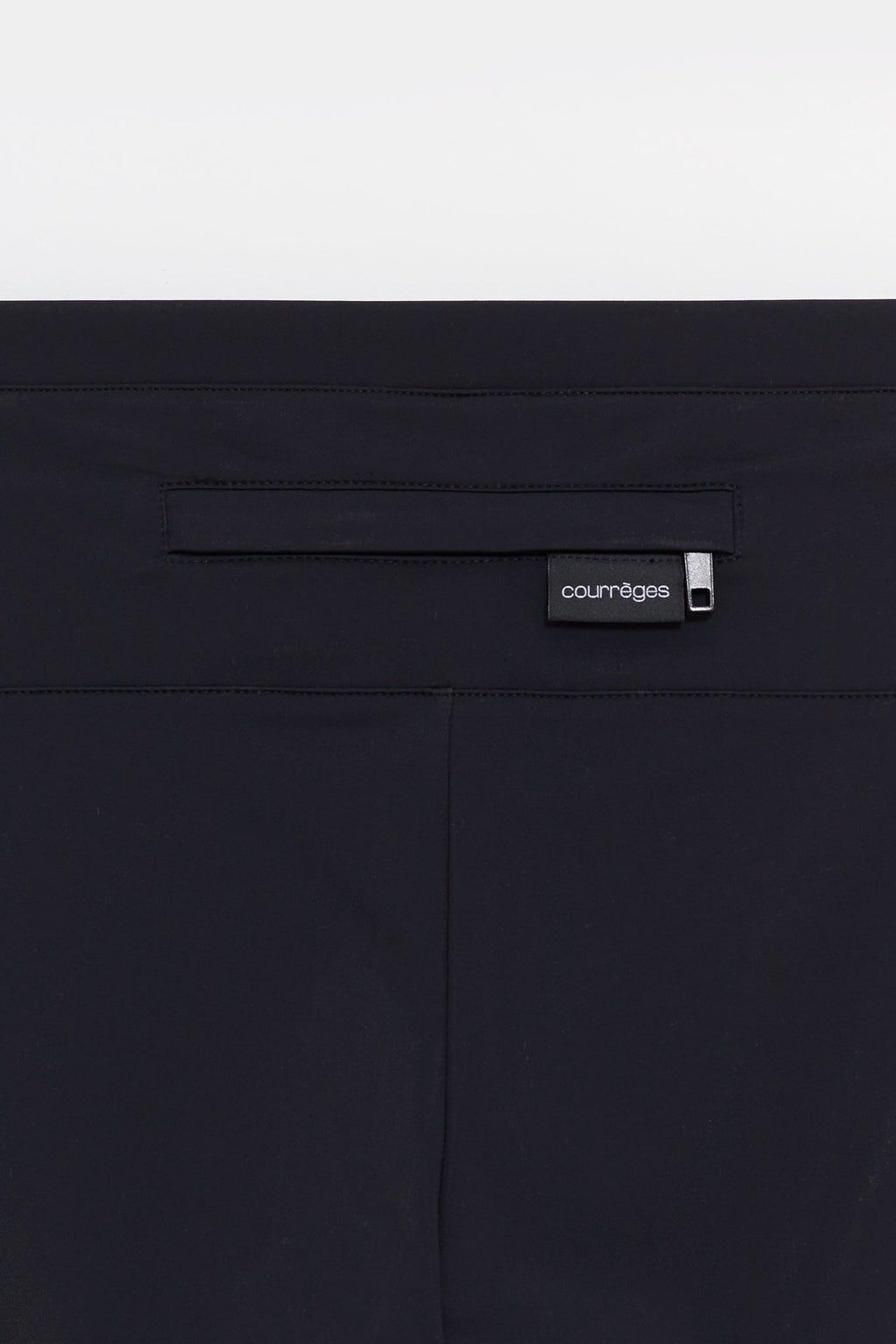 COURREGES BLACK REVERSED TECH JERSEY PANTS