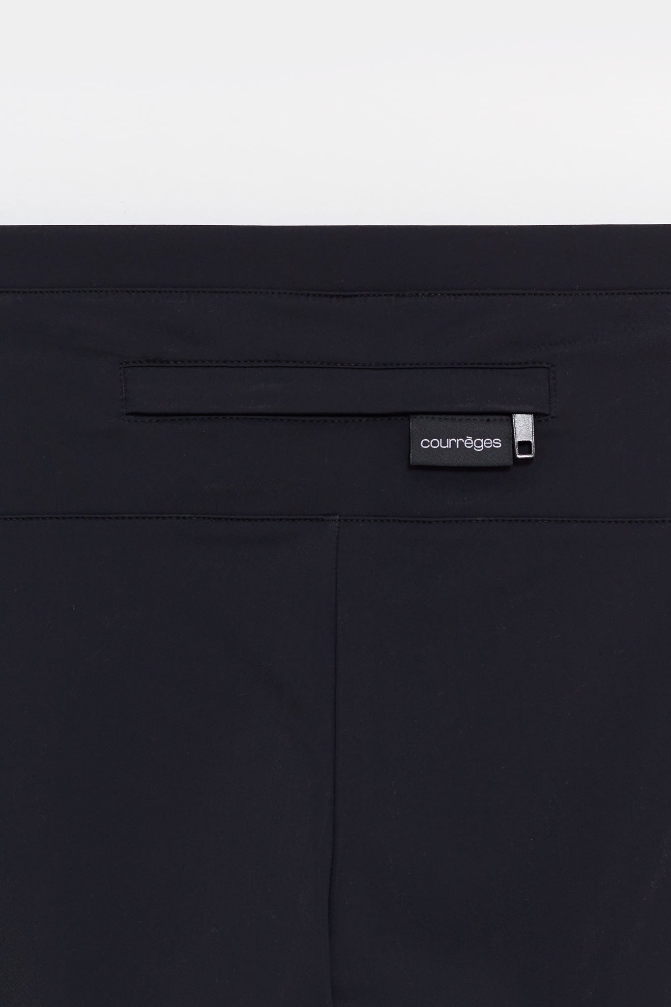 COURREGES BLACK REVERSED TECH JERSEY PANTS