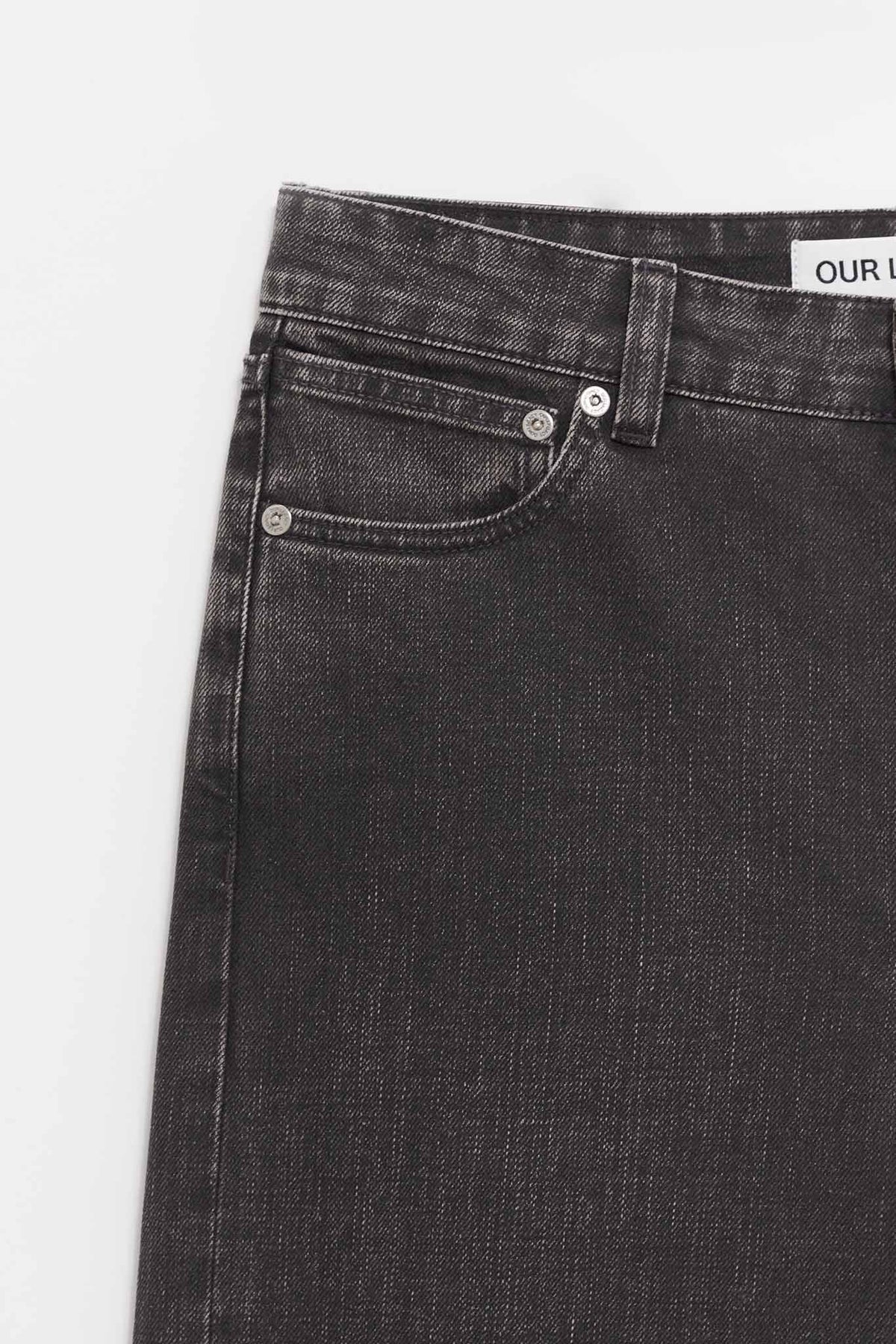 OUR LEGACY BLACK COATED TREBLE CUT TROUSERS